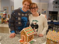 A bold choice, decapitated ginger bread men and blood dripping windows  Scot and Rachel Christmas Sweaters and a Haunted Gingerbread House